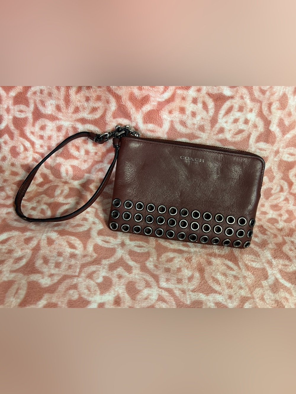 COACH vintage Burgundy Leather Wristlet with Grommet Detail